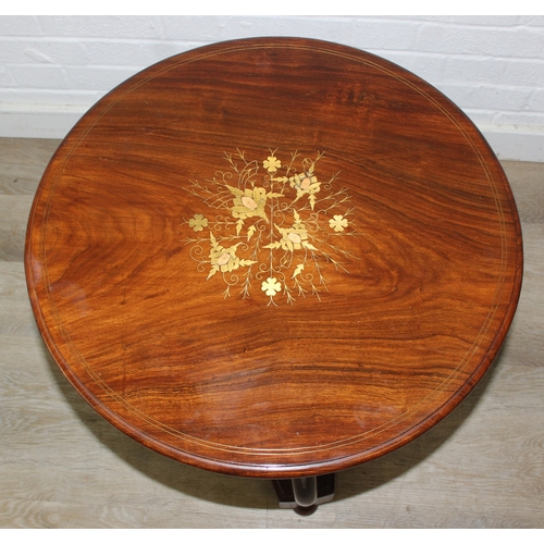 80 - A vintage brass inlaid hardwood table, possibly Indian, with swan shaped supports, 56cm in diameter ... 