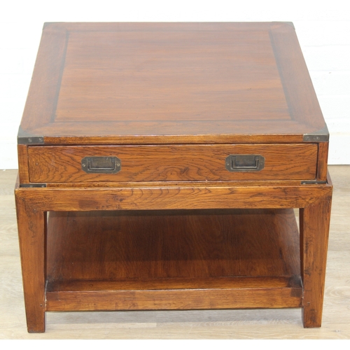 79 - An unusual low side table in two parts, the top part a single campaign style drawer with brass corne... 
