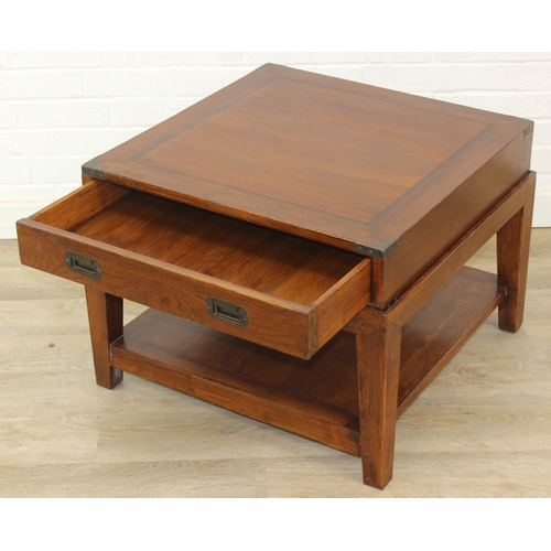 79 - An unusual low side table in two parts, the top part a single campaign style drawer with brass corne... 
