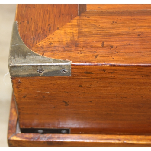 79 - An unusual low side table in two parts, the top part a single campaign style drawer with brass corne... 