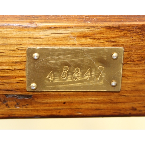 79 - An unusual low side table in two parts, the top part a single campaign style drawer with brass corne... 