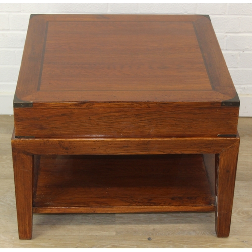 78 - An unusual oak or elm low side table in two parts, the top part a single campaign style drawer with ... 