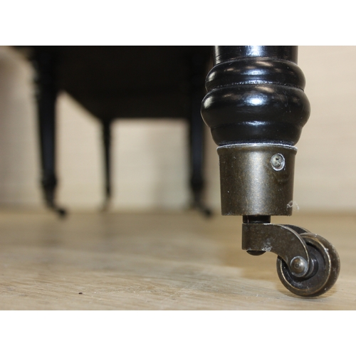 93 - A very large antique style footstool with kilim style top and turned ebonised legs, 220cm x 45cm x 5... 