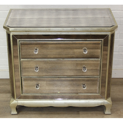 104 - An unusual gilt and distressed mirrored three drawer chest of drawers with glass handles, 91cm x 51c... 
