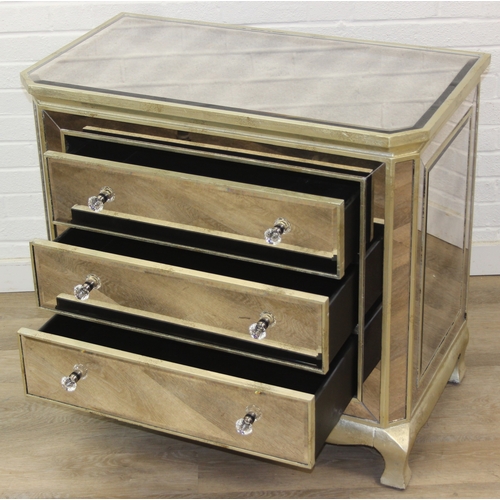 104 - An unusual gilt and distressed mirrored three drawer chest of drawers with glass handles, 91cm x 51c... 
