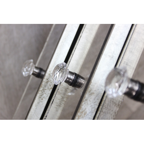 104 - An unusual gilt and distressed mirrored three drawer chest of drawers with glass handles, 91cm x 51c... 