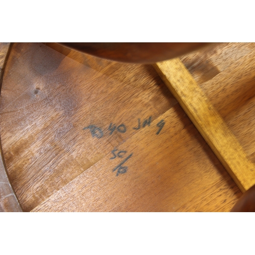 81 - An antique style round topped table with a trio of carved swans to base, 55cm in diameter x 66cm tal... 