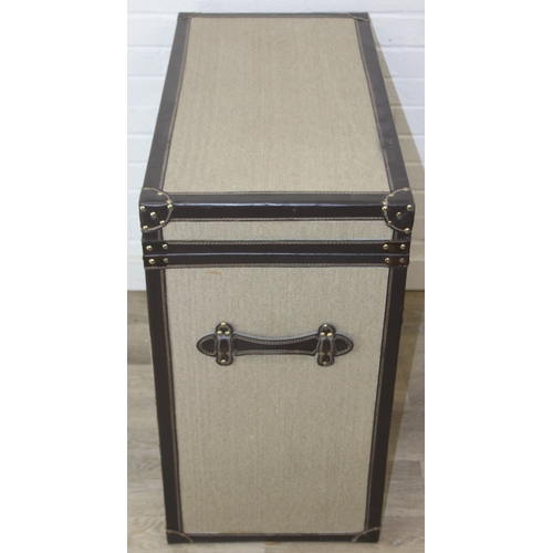 88 - An unusual fabric and faux leather aviator style chest of drawers, a lift up top over two banks of t... 