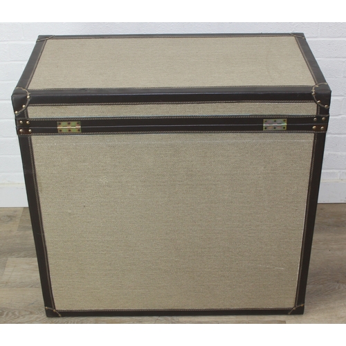 88 - An unusual fabric and faux leather aviator style chest of drawers, a lift up top over two banks of t... 