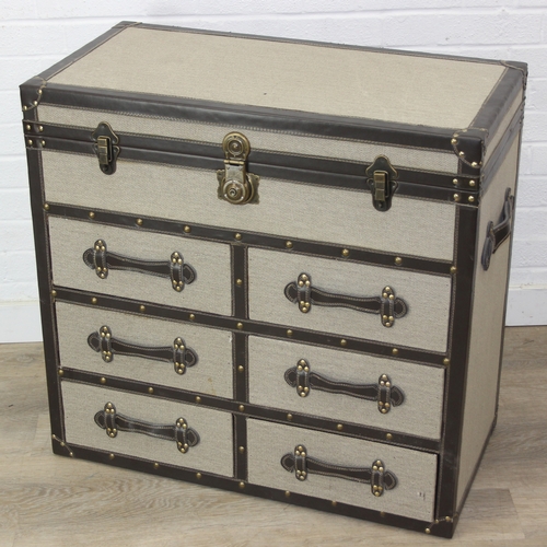 89 - An unusual fabric and faux leather aviator style chest of drawers, a lift up top over two banks of t... 