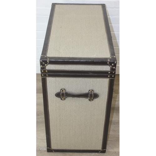 89 - An unusual fabric and faux leather aviator style chest of drawers, a lift up top over two banks of t... 