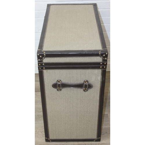 89 - An unusual fabric and faux leather aviator style chest of drawers, a lift up top over two banks of t... 