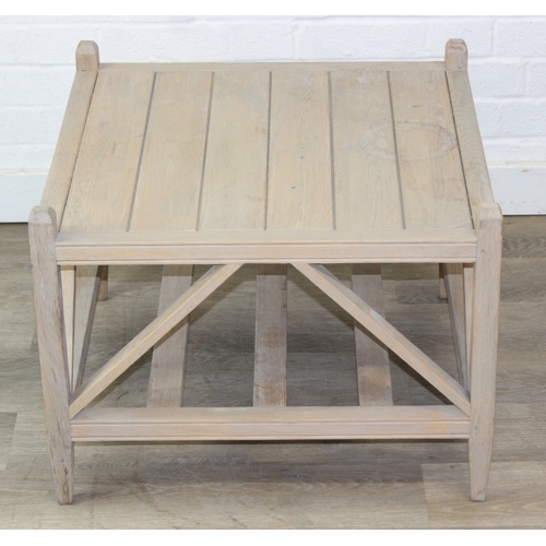 84 - A unusual oak light-wood coffee table with slatted base, 60cm x 60cm x 45cm