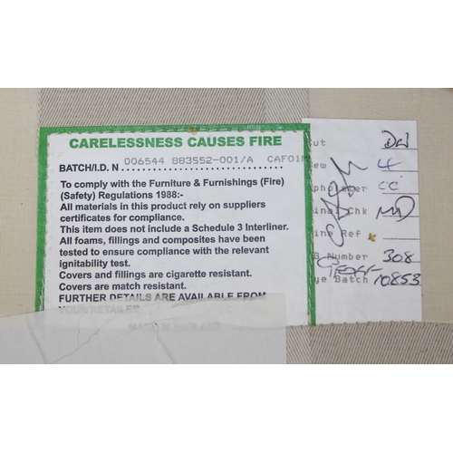 69 - An antique style white and cream striped Victorian style armchair with turned wooden legs, 83cm wide... 