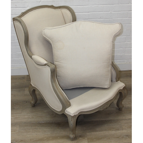 96 - An French style Fauteuil or armchair with distressed mocha coloured painted exposed wooden frame, th... 