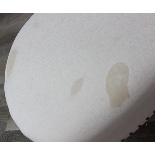 66 - Modern chaise lounge in cream upholstery, raised on blonde wood legs with brass castors, 150cm x 80c... 