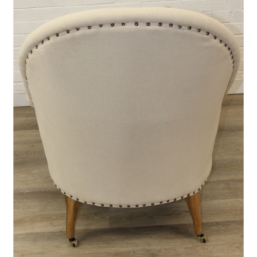 66 - Modern chaise lounge in cream upholstery, raised on blonde wood legs with brass castors, 150cm x 80c... 