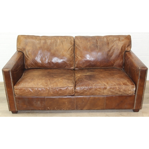 59 - Brown leather sofa with stud work detail to squared arms, 172cm x 98cm x 78cm