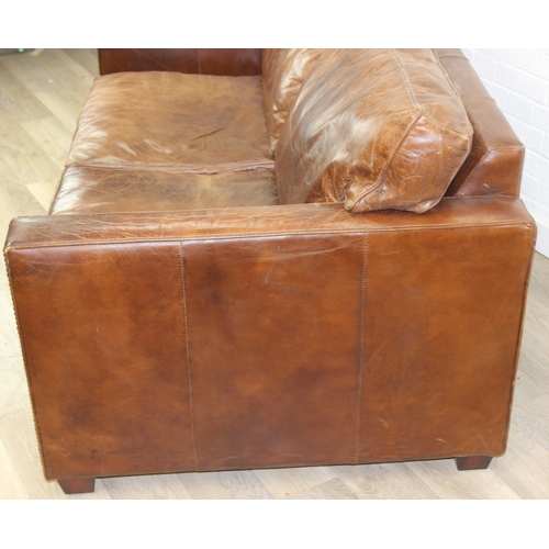 59 - Brown leather sofa with stud work detail to squared arms, 172cm x 98cm x 78cm