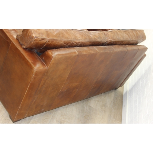 59 - Brown leather sofa with stud work detail to squared arms, 172cm x 98cm x 78cm