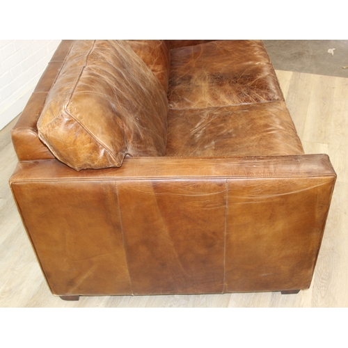59 - Brown leather sofa with stud work detail to squared arms, 172cm x 98cm x 78cm