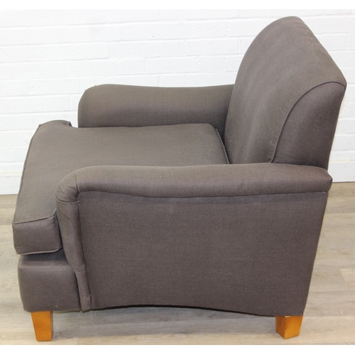 62 - Low chocolate brown armchair in hessian type material, 90cm wide x 75cm tall, one of two in the sale