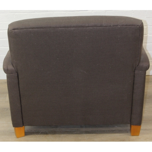 62 - Low chocolate brown armchair in hessian type material, 90cm wide x 75cm tall, one of two in the sale