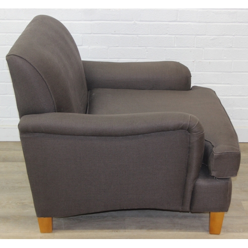 62 - Low chocolate brown armchair in hessian type material, 90cm wide x 75cm tall, one of two in the sale