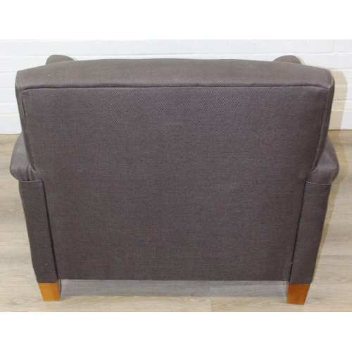61 - Low chocolate brown armchair in hessian type material, 90cm wide x 75cm tall, one of two in the sale