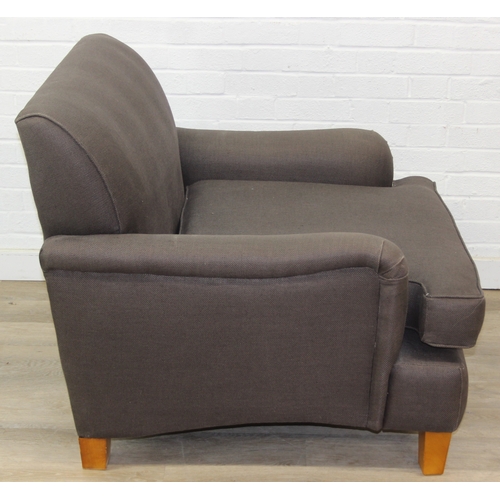 61 - Low chocolate brown armchair in hessian type material, 90cm wide x 75cm tall, one of two in the sale