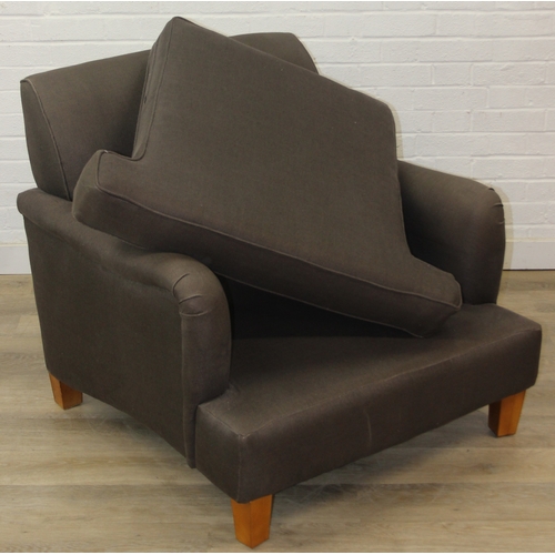 61 - Low chocolate brown armchair in hessian type material, 90cm wide x 75cm tall, one of two in the sale