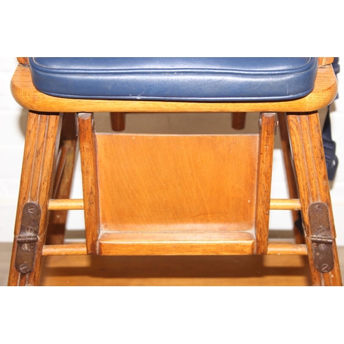 98 - A vintage child's highchair with blue upholstery, 54cm x 52cm x 96cm