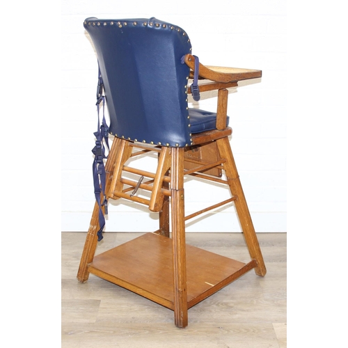 98 - A vintage child's highchair with blue upholstery, 54cm x 52cm x 96cm