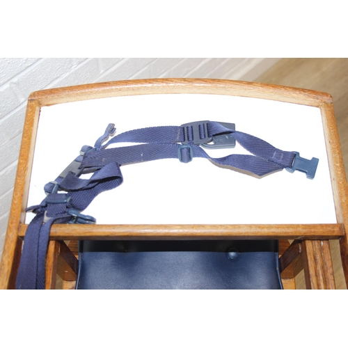 98 - A vintage child's highchair with blue upholstery, 54cm x 52cm x 96cm