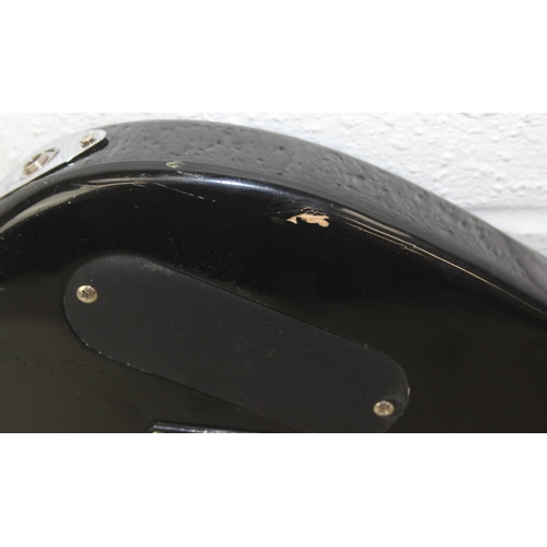 735 - An Encore electric guitar with black body, 98cm long