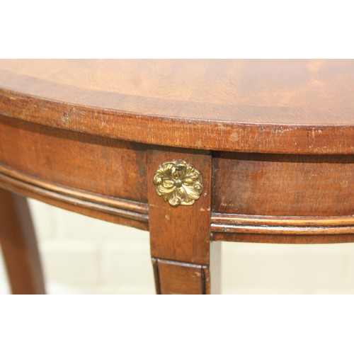 106 - A modern demi-lune side table of Regency design and a retro style hardwood magazine rack, the table ... 