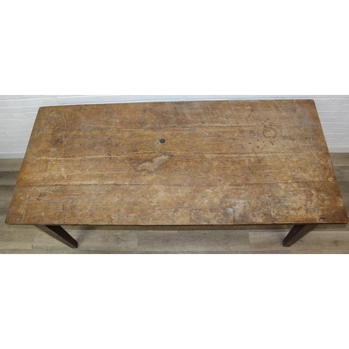 100 - A large antique plank topped farmhouse table with scrub top and painted base, believed to be Elm, 20... 