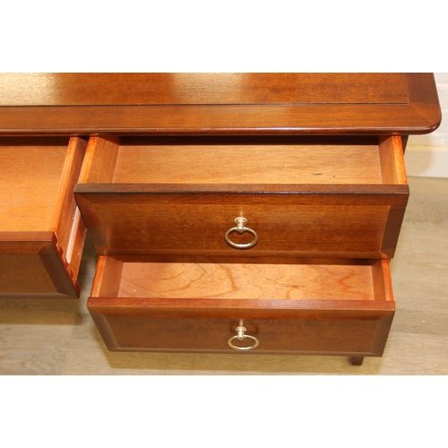 9 - Retro Stag dressing table with five drawers and triple mirror, approx 152cm x 48cm x 128cm