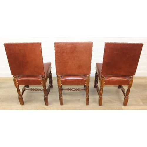 56 - A trio of Carolean style high backed chairs with brown leather seats and backs and studded details, ... 