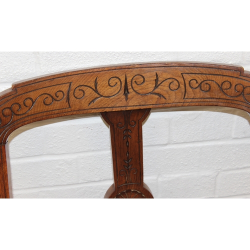 58 - A set of Four matched salon chairs with carved and curved backs and gold coloured upholstery, each 8... 