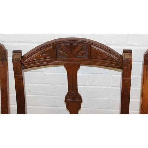 58 - A set of Four matched salon chairs with carved and curved backs and gold coloured upholstery, each 8... 