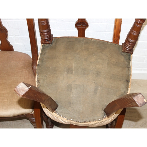 58 - A set of Four matched salon chairs with carved and curved backs and gold coloured upholstery, each 8... 