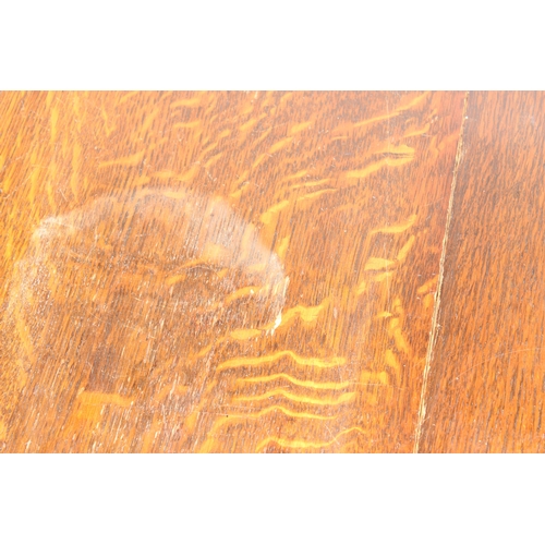 67 - An early 20th century oak dropleaf table with barleytwist supports, 77cm x 41cm (112cm) x 74cm