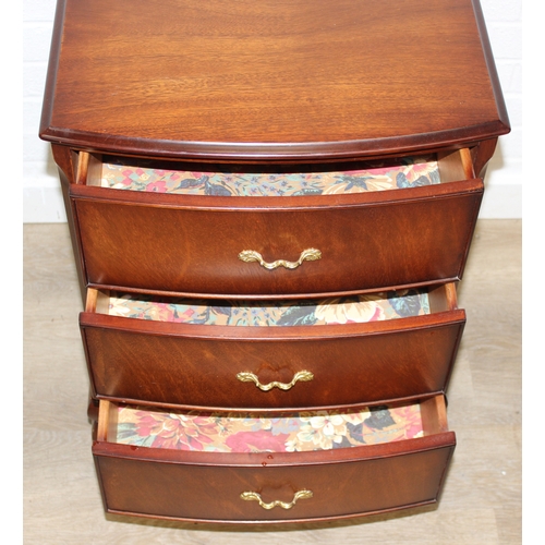 68 - A modern three drawer chest of drawers with decorative brass handles, 51cm x 49cm x 73cm