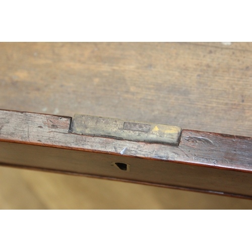 79 - A Regency period mahogany console table with long single drawer, raised back rail, all standing on t... 