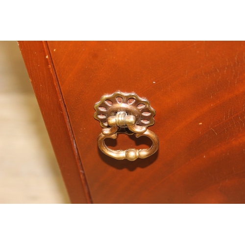 84 - A vintage mahogany bedside cabinet with single cupboard and open section, 40cm x 36cm x 70cm