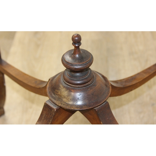 118 - A vintage mahogany side table with decorative carved edge, standing on four thin splayed legs, 61cm ... 