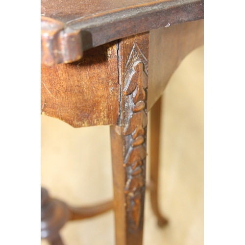 118 - A vintage mahogany side table with decorative carved edge, standing on four thin splayed legs, 61cm ... 