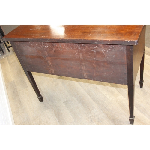 119 - A Regency period mahogany bow fronted sideboard with five drawers and brass handles, 121cm x 68cm x ... 