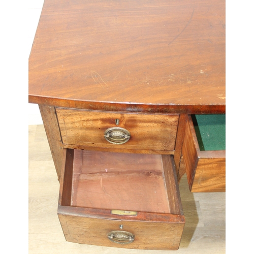 119 - A Regency period mahogany bow fronted sideboard with five drawers and brass handles, 121cm x 68cm x ... 